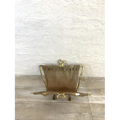 22 - A 1980s David Marshall brass and brown suede magazine rack - approx. 36cm high x 57cm long x 39cm wi... 