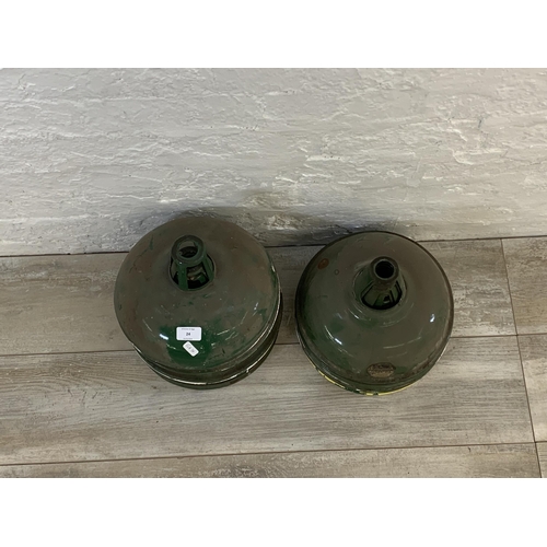 24 - Eighteen mid 20th century Coolicon green and white enamel factory ceiling light shades