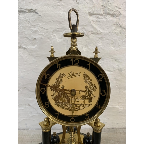 25 - A vintage German Schatz brass and glass anniversary mantel clock - approx. 32cm high