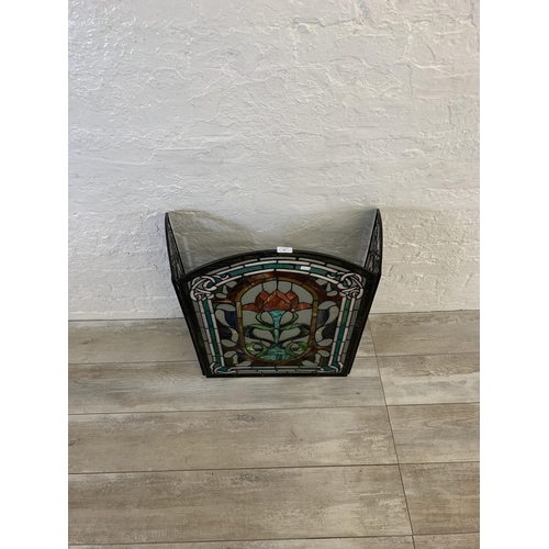 26 - An Arts & Crafts style stained glass three section fire screen - approx. 71cm high x 107cm wide