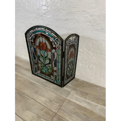 26 - An Arts & Crafts style stained glass three section fire screen - approx. 71cm high x 107cm wide