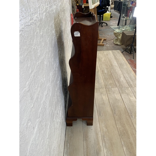 29 - A J. Sydney Smith mahogany waterfall free-standing bookcase - approx. 113cm high x 57cm wide