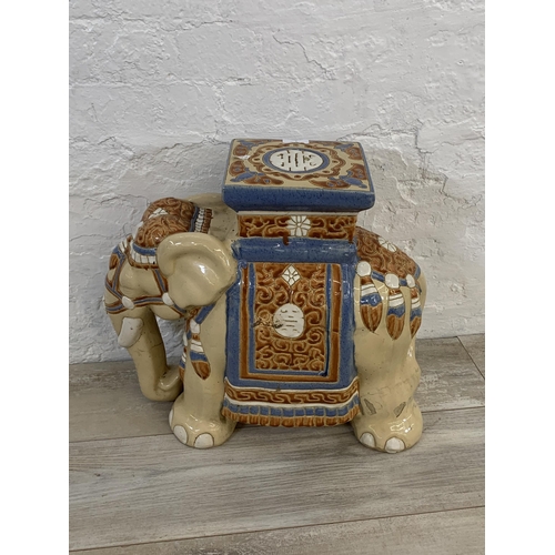 4 - A ceramic elephant jardinière stand/side table - approx. 44cm high