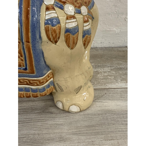 4 - A ceramic elephant jardinière stand/side table - approx. 44cm high