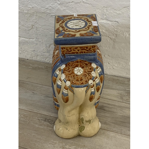 4 - A ceramic elephant jardinière stand/side table - approx. 44cm high