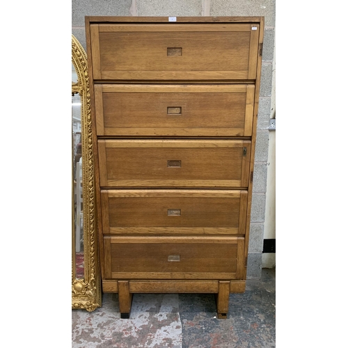 41 - A mid 20th century Staverton oak five door solicitor's cabinet - approx. 186cm high x 92cm wide x 36... 