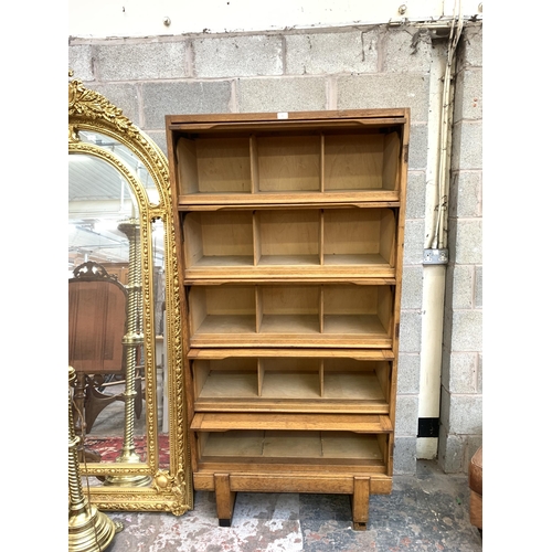 41 - A mid 20th century Staverton oak five door solicitor's cabinet - approx. 186cm high x 92cm wide x 36... 