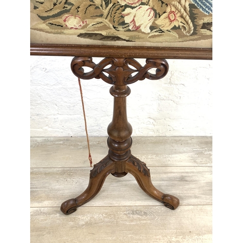 43 - A Victorian rosewood and walnut tapestry polescreen on tripod base - approx. 134cm high x 54cm wide