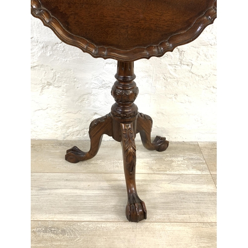 44 - A George III style mahogany tilt top tripod occasional table on ball and claw supports - approx. 67c... 