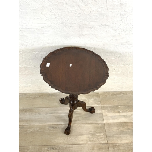 44 - A George III style mahogany tilt top tripod occasional table on ball and claw supports - approx. 67c... 