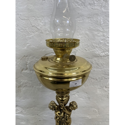 48 - A Victorian style brass converted electric oil lamp - approx. 51cm high