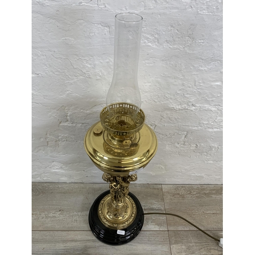 48 - A Victorian style brass converted electric oil lamp - approx. 51cm high