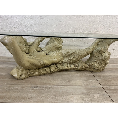 5 - A sculptural fibreglass mermaid and bevelled glass rectangular coffee table - approx. 41cm high x 12... 