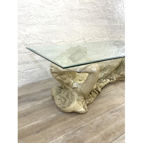 5 - A sculptural fibreglass mermaid and bevelled glass rectangular coffee table - approx. 41cm high x 12... 