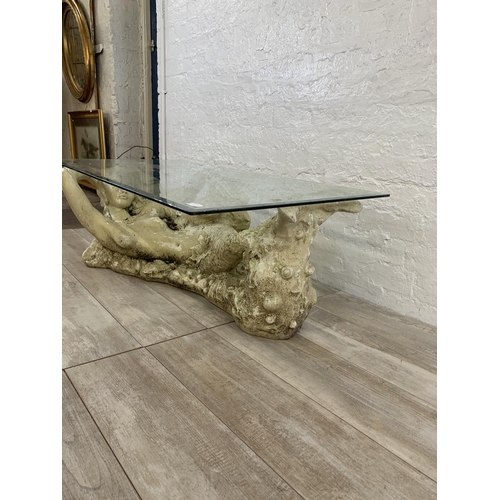 5 - A sculptural fibreglass mermaid and bevelled glass rectangular coffee table - approx. 41cm high x 12... 