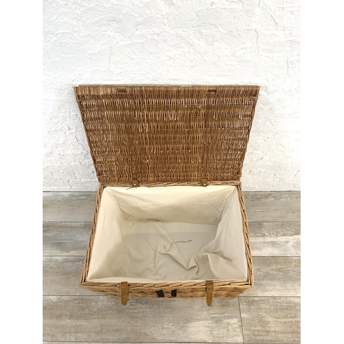 51 - A Harrods wicker basket - approx. 44cm high x 65cm wide x 45cm deep