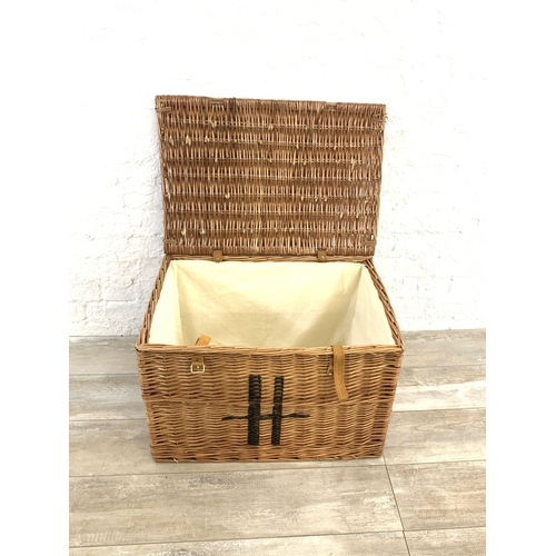 52 - A Harrods wicker basket - approx. 44cm high x 65cm wide x 45cm deep