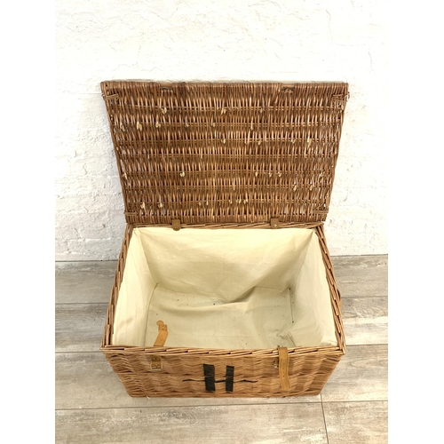 52 - A Harrods wicker basket - approx. 44cm high x 65cm wide x 45cm deep