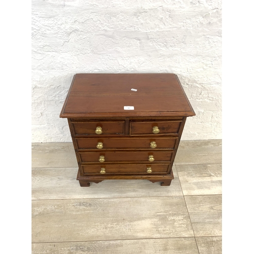 57 - A Georgian style hardwood miniature chest of five drawers - approx. 50cm high x 50cm wide x 31.5cm d... 