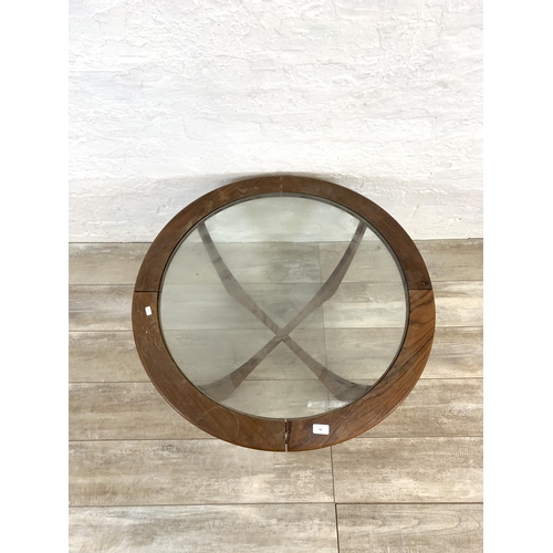 62 - A mid 20th century G Plan Astro teak and glass circular coffee table - approx. 46cm high x 84cm diam... 