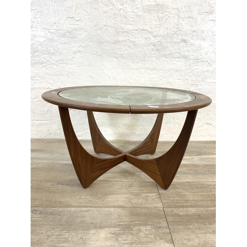 62 - A mid 20th century G Plan Astro teak and glass circular coffee table - approx. 46cm high x 84cm diam... 