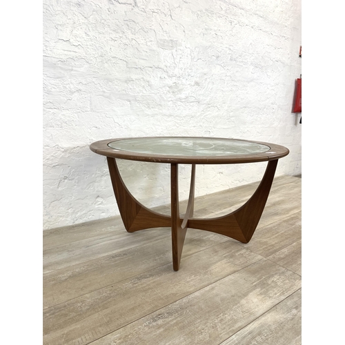 62 - A mid 20th century G Plan Astro teak and glass circular coffee table - approx. 46cm high x 84cm diam... 