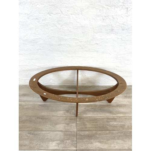 64 - A mid 20th century G Plan Astro teak oval coffee table