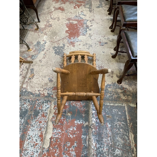 67 - A oak extending dining table with four oak farmhouse dining chairs