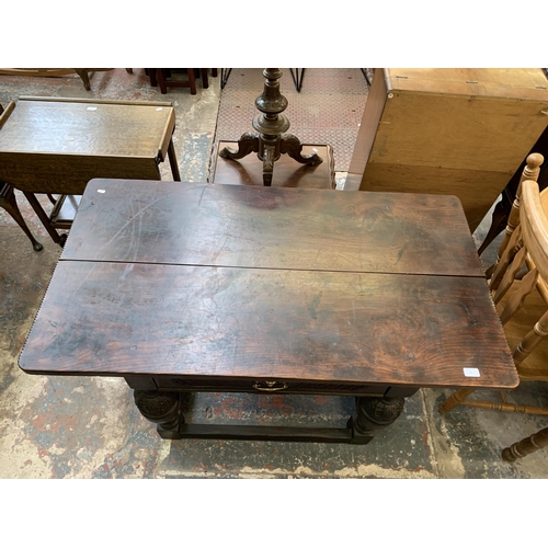 68 - A Jacobean Revival oak refectory table - approx. 73cm high x 128cm long x 70cm wide