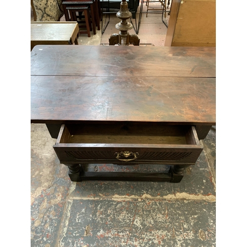 68 - A Jacobean Revival oak refectory table - approx. 73cm high x 128cm long x 70cm wide