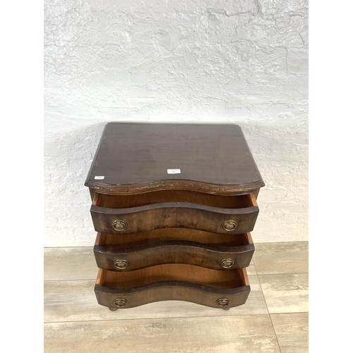 73 - A Queen Anne style mahogany serpentine chest of three drawers on cabriole supports - approx. 77cm hi... 