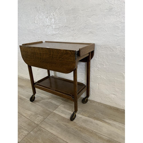 74 - A mid 20th century oak drop leaf tea trolley