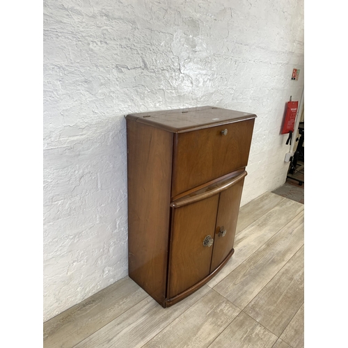 76 - A mid 20th century walnut cocktail  cabinet - approx. 93cm high x 61cm wide x 32cm deep