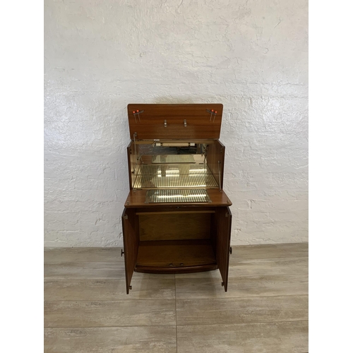 76 - A mid 20th century walnut cocktail  cabinet - approx. 93cm high x 61cm wide x 32cm deep