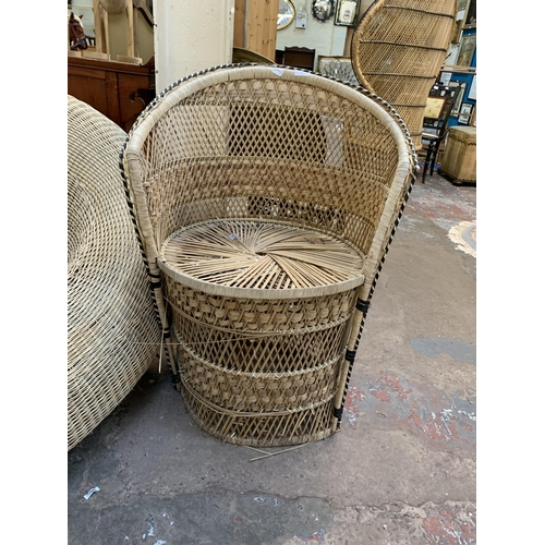 8 - Ten pieces of wicker furniture and baskets to include 1970s tub chair, picnic basket, twin handled b... 