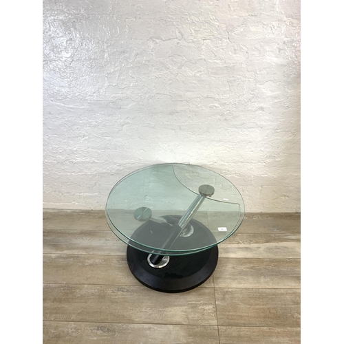 81 - Two items, one standard lamp and one contemporary glass and chrome two tier circular coffee table