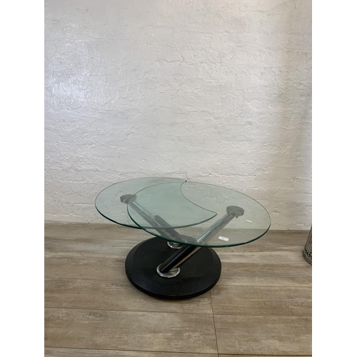 81 - Two items, one standard lamp and one contemporary glass and chrome two tier circular coffee table