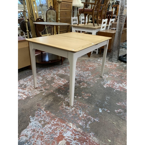 83 - An Arighi Bianchi oak and grey painted extending dining table - approx. 79cm high x 120cm long x 85c... 