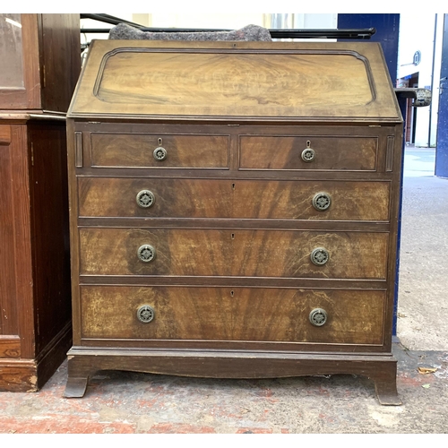 85 - A Georgian style mahogany bureau - approx. 105cm high x 91cm wide x 52cm deep