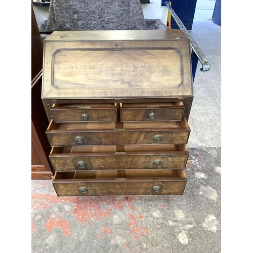 85 - A Georgian style mahogany bureau - approx. 105cm high x 91cm wide x 52cm deep