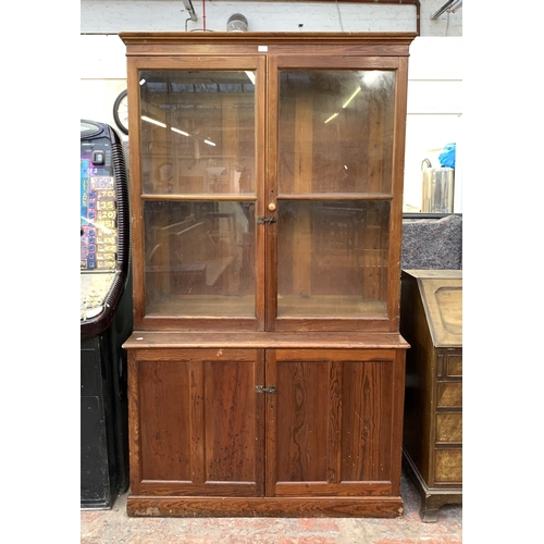 86 - A 19th century pitch pine bookcase - approx. 214cm high x 125cm wide x 52cm deep