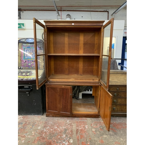 86 - A 19th century pitch pine bookcase - approx. 214cm high x 125cm wide x 52cm deep