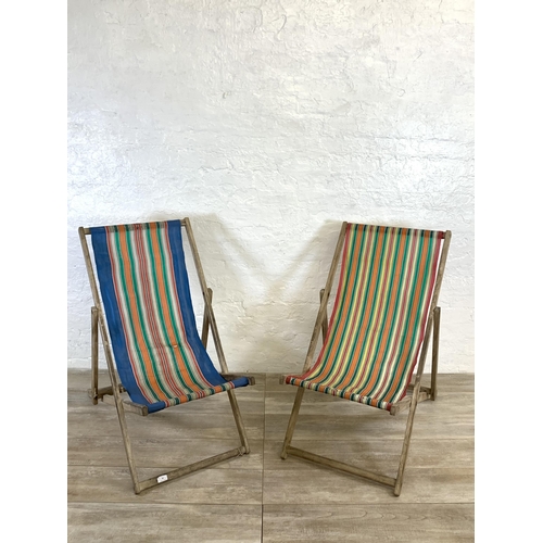 88 - Two mid 20th century beech framed sun loungers