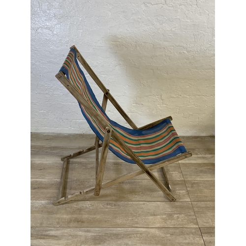 88 - Two mid 20th century beech framed sun loungers