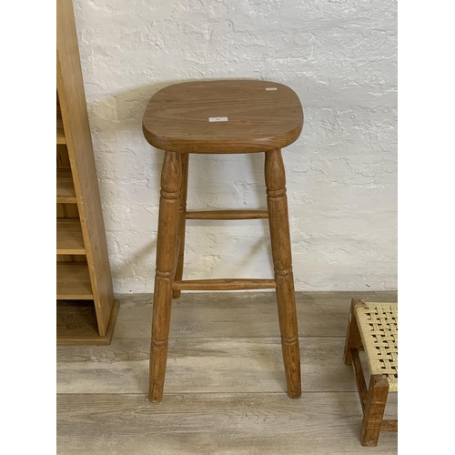 90 - Five pieces of furniture to include pine kitchen bar stool, light oak freestanding CD rack etc.