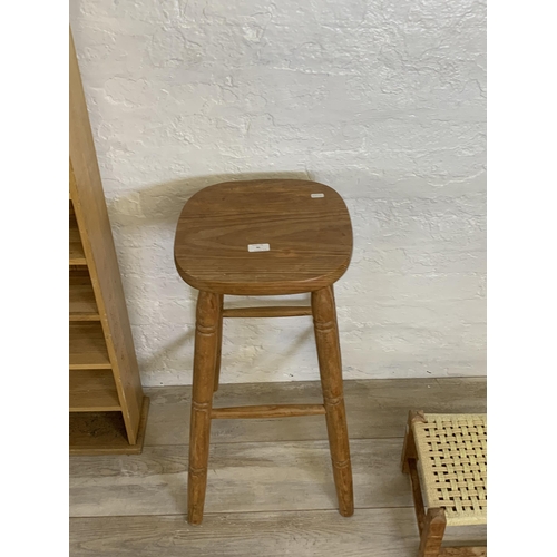 90 - Five pieces of furniture to include pine kitchen bar stool, light oak freestanding CD rack etc.