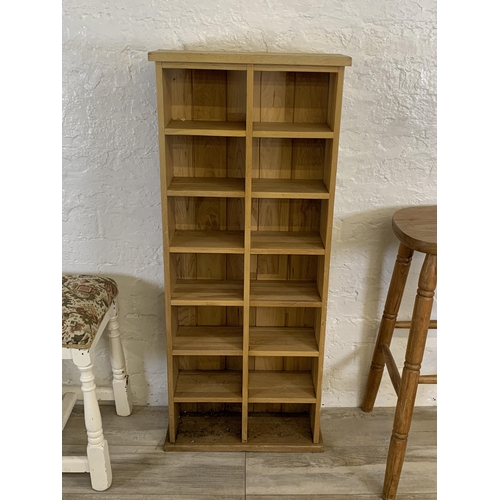 90 - Five pieces of furniture to include pine kitchen bar stool, light oak freestanding CD rack etc.