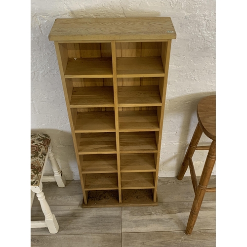 90 - Five pieces of furniture to include pine kitchen bar stool, light oak freestanding CD rack etc.