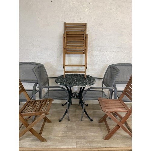 95 - Nine pieces of garden furniture comprising set of four grey metal stacking armchairs, set of four te... 