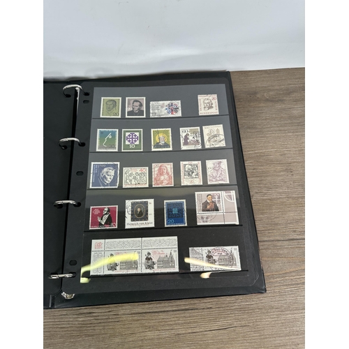 546 - Five albums containing a collection of worldwide stamps